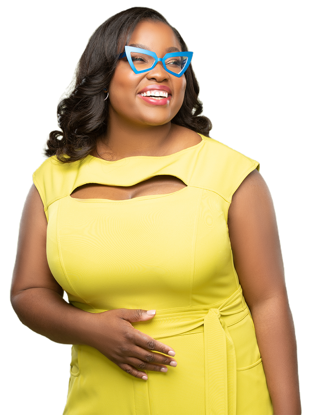 Ashley Kirkwood smiling in a yellow dress and blue glasses
